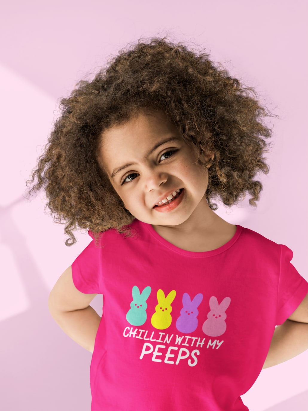 smiling child with pink t-shirt